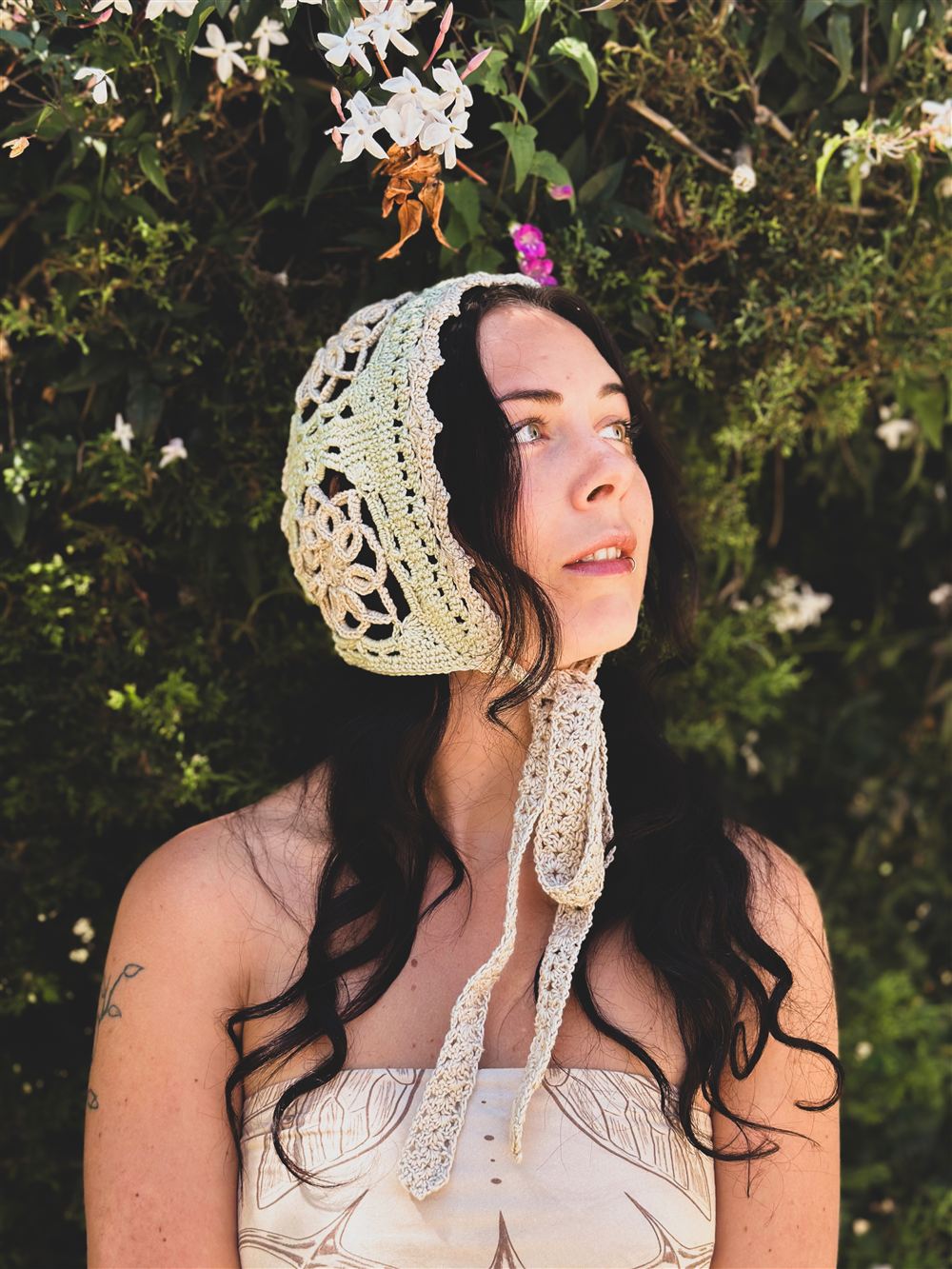 Lace bonnet in the forest, looking up